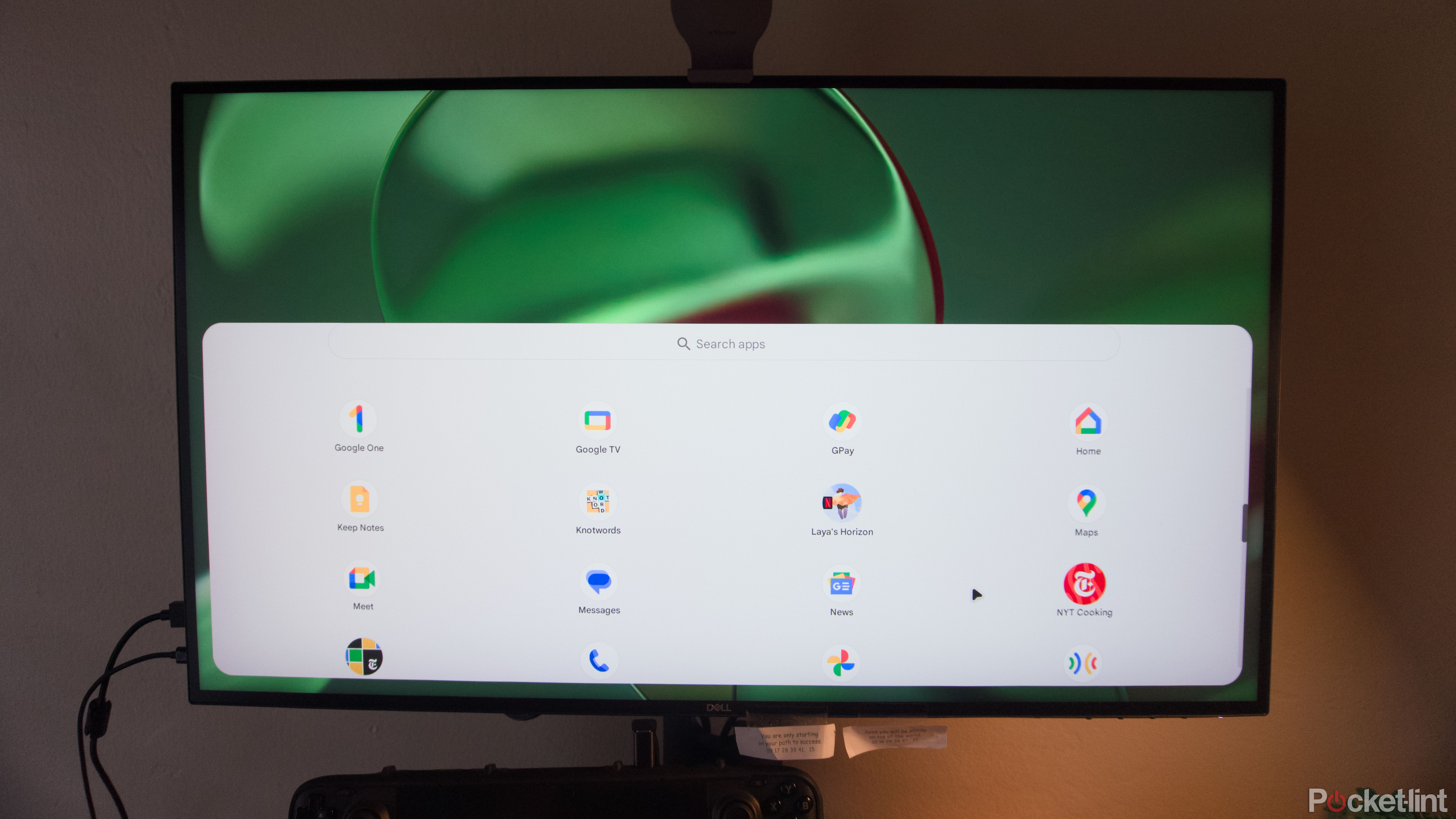 A stretched Android app drawer on a desktop monitor.