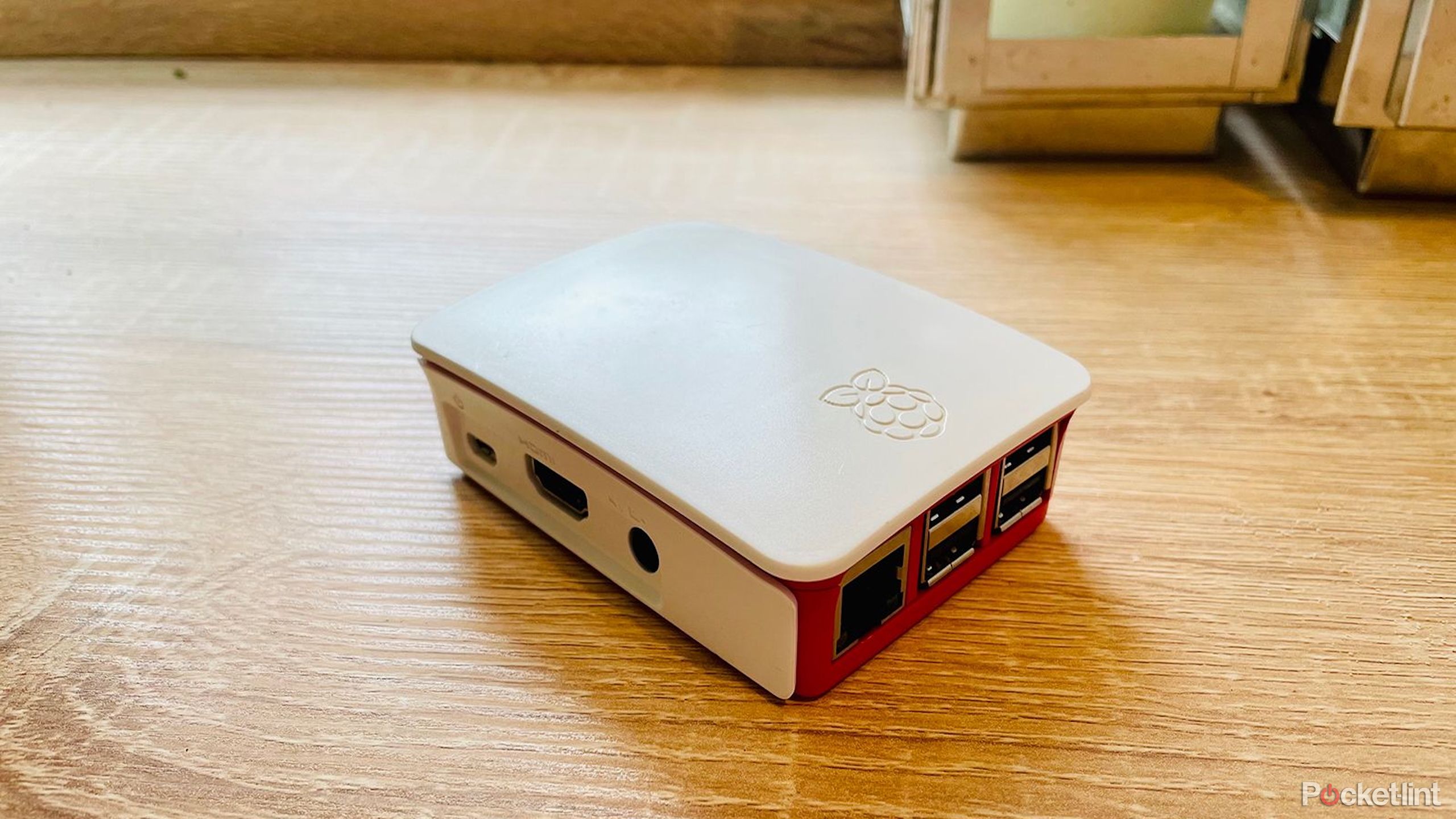 A Raspberry Pi 3B in an official Raspberry Pi case.