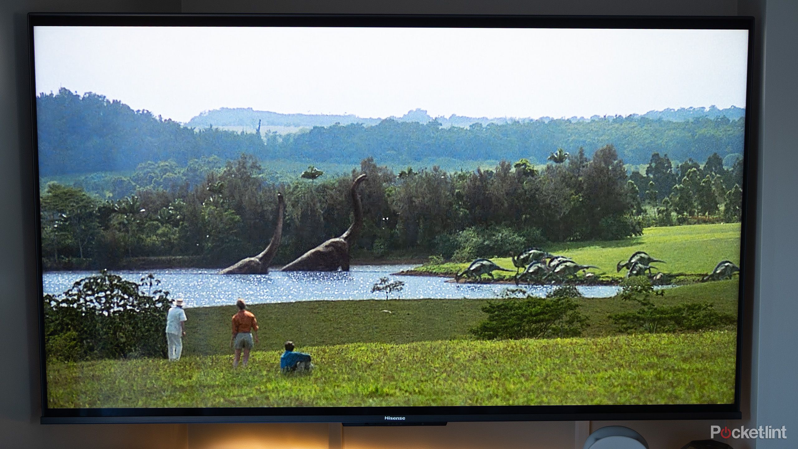 A Hisense U8H TV showing Jurassic Park.