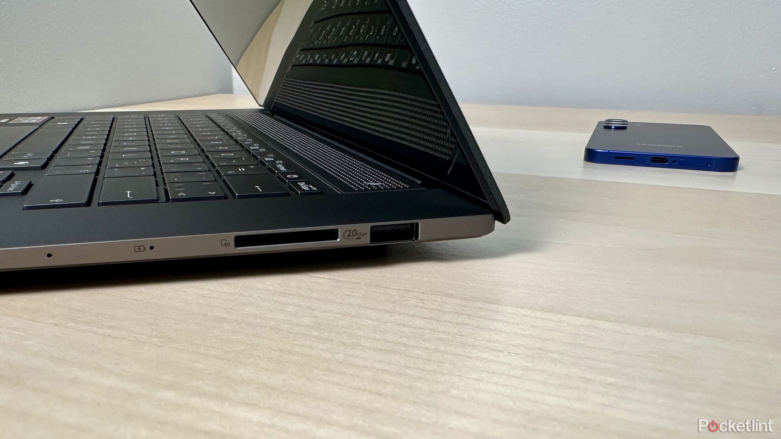 USB port on laptop and phone.