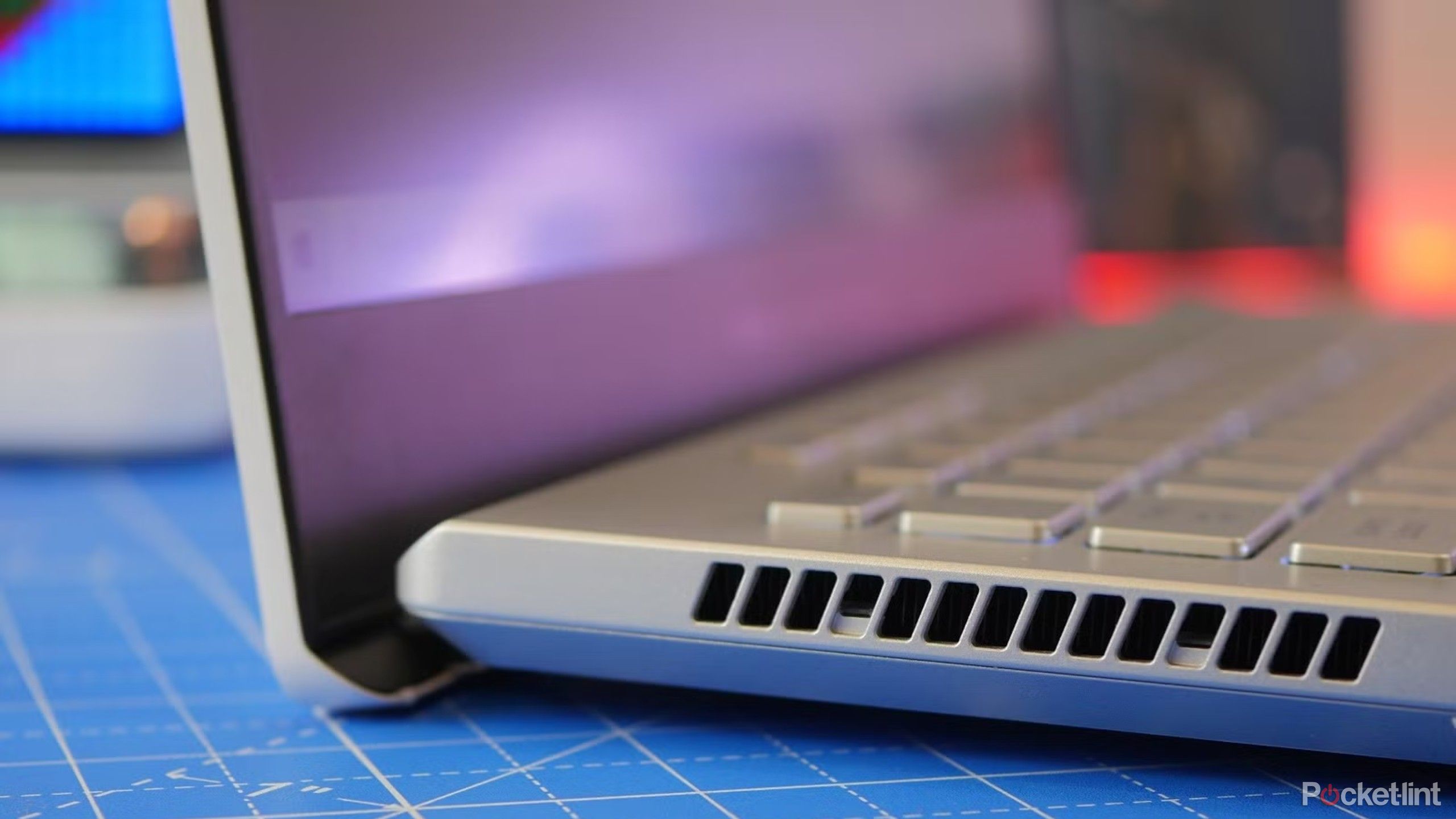 Asus G14 gaming laptop close up on the side. 