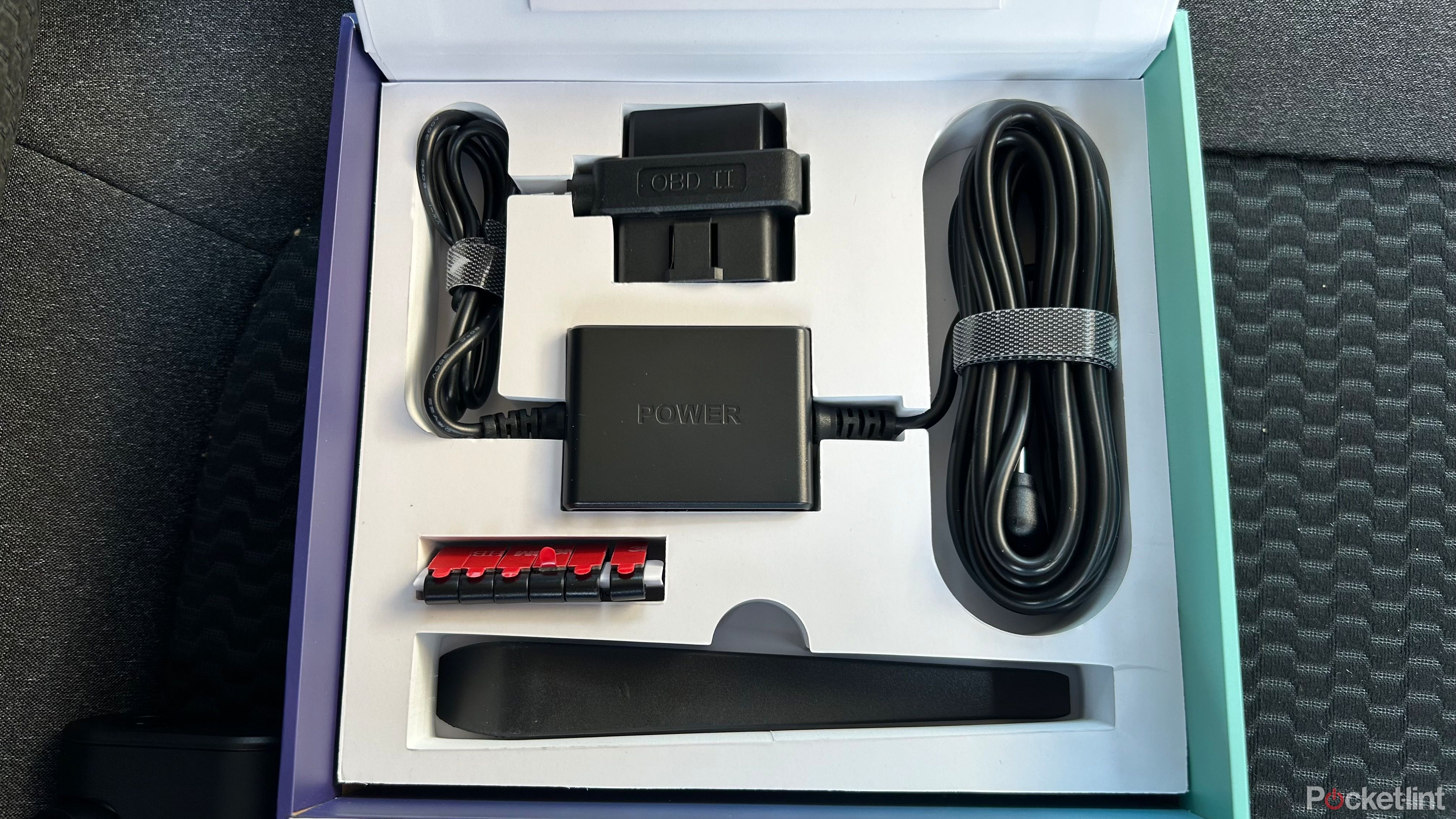 Nexar Beam2 Mini Dash Cam and components in the box. 