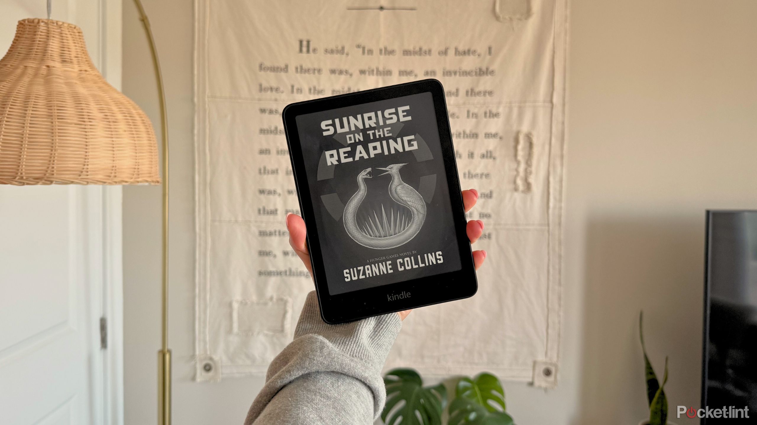 Sunrise on the Reaping cover page on a kindle paperwhite.
