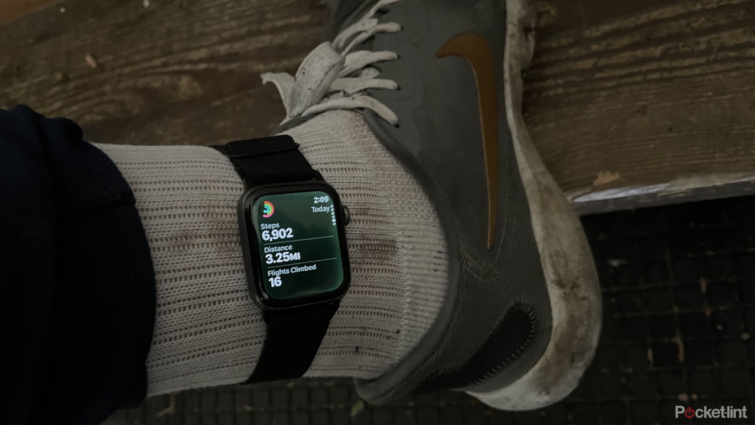 An Apple Watch around an ankle showing the steps of the day