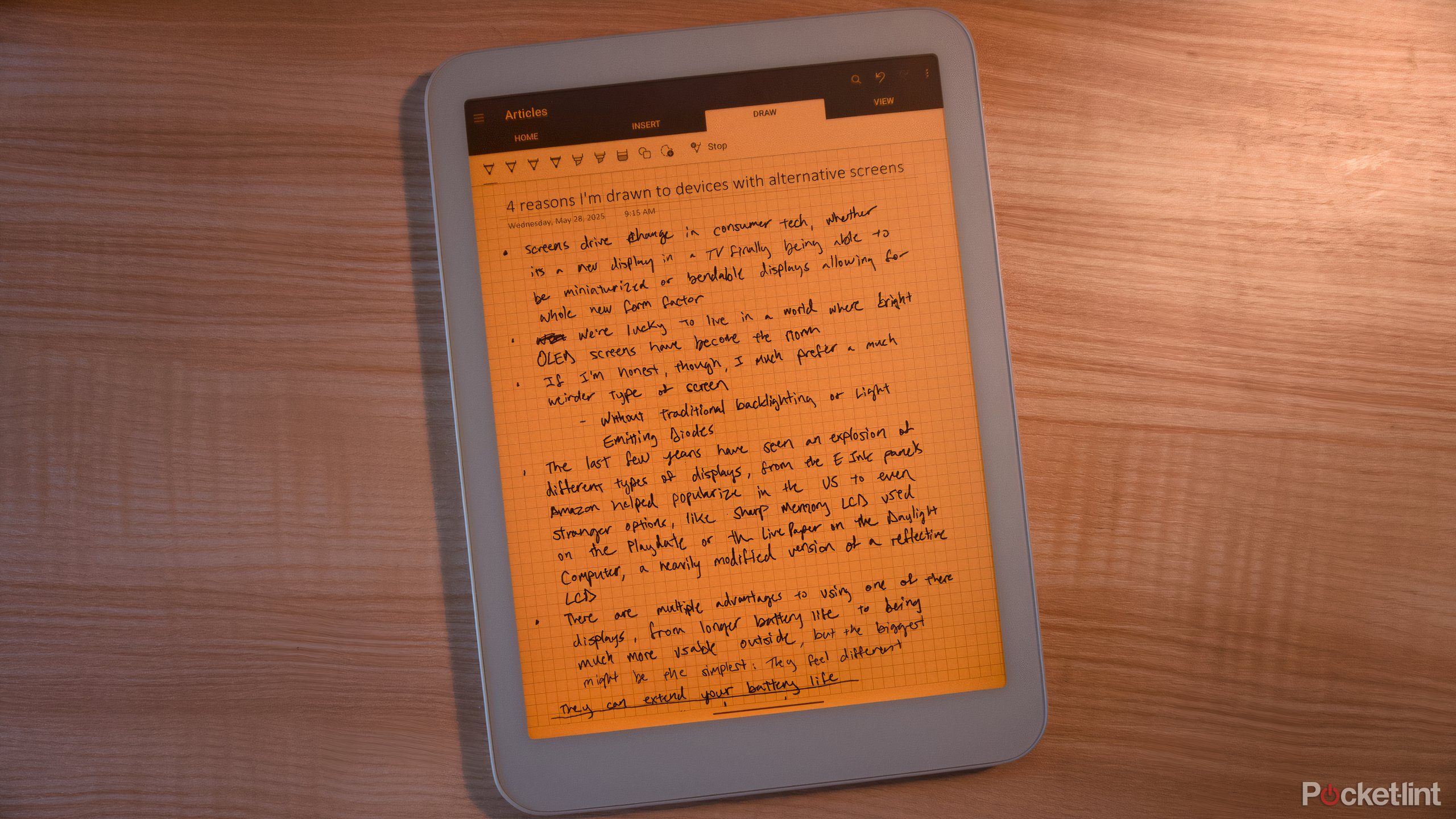 A Daylight DC-1 tablet with its orange backlight on.