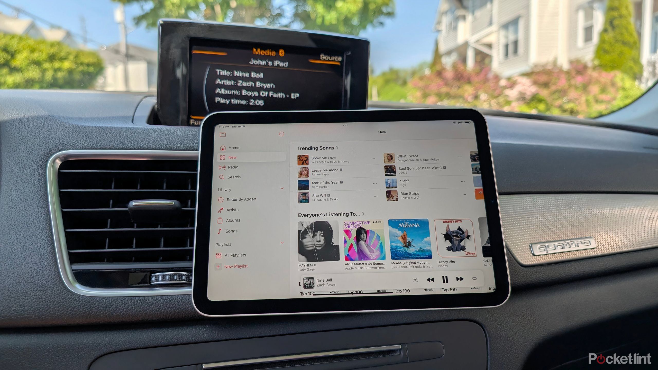 An iPad mini mounted in a car using MagSafe.