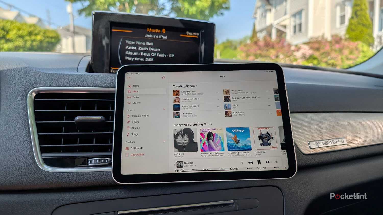 An iPad mini mounted in a car using MagSafe.