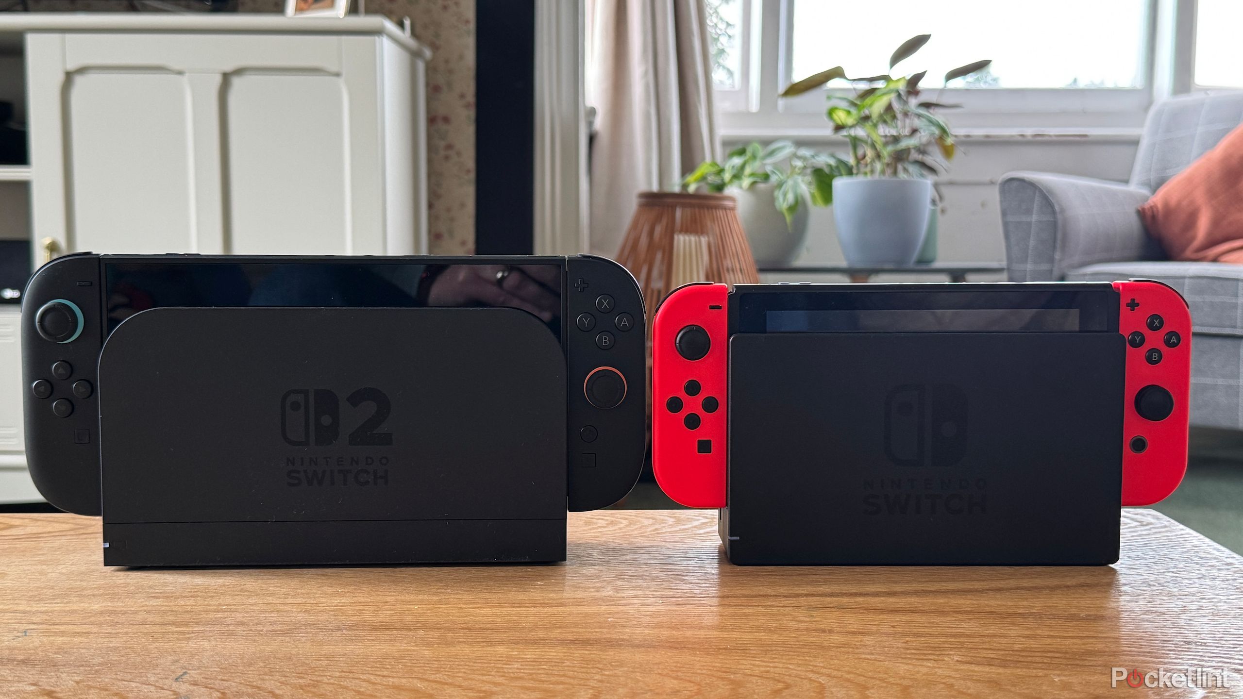 Nintendo Switch 2 and Nintendo Switch side-by-side in their docks.