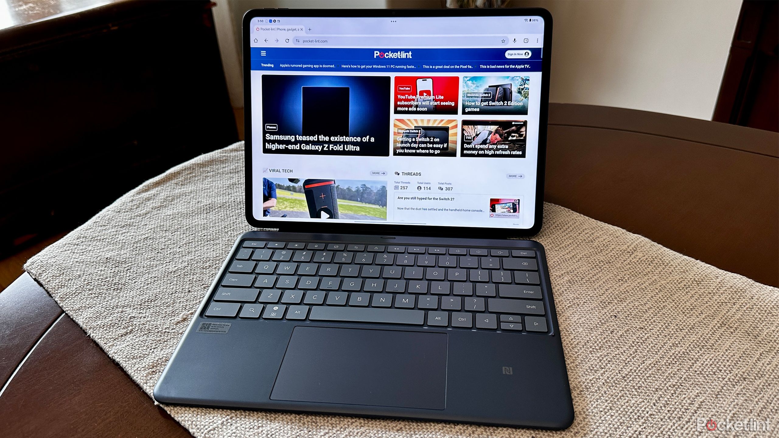 OnePlus Pad 3 with Smart Keyboard folio attachment.