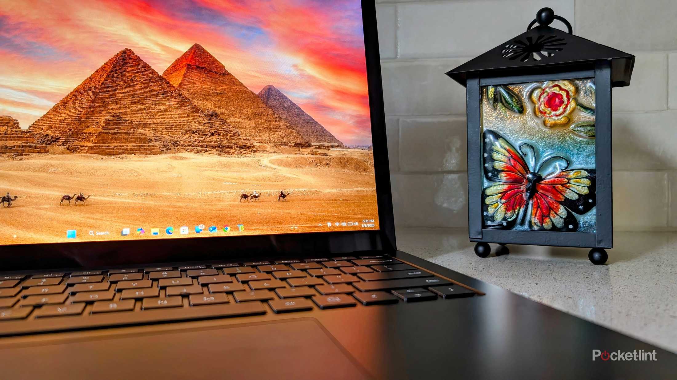 I use this Windows 11 app to make my PC taskbar transparent