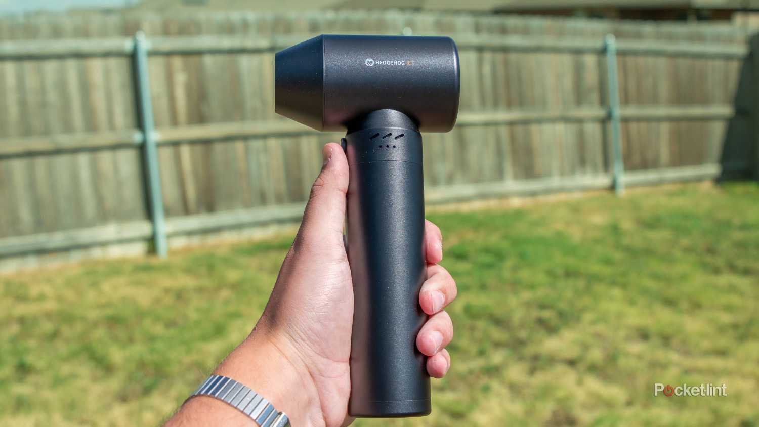 A still photo of the Hedgehog Dryer JET being held with the nozzle facing the left. 