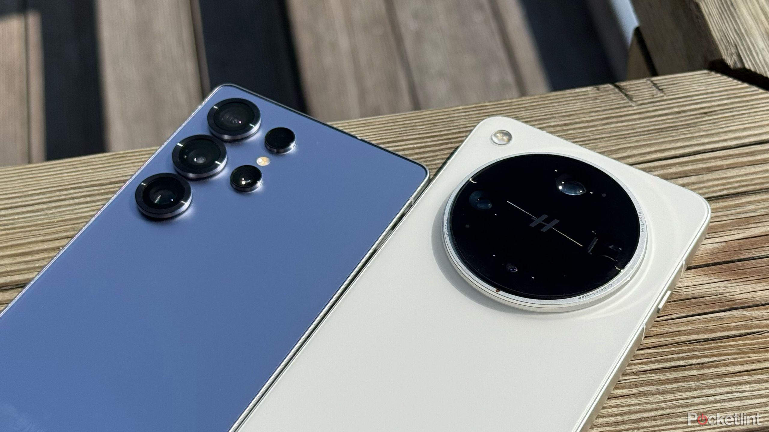Galaxy S25 Ultra and Oppo Find X8 Ultra on a wooden bench