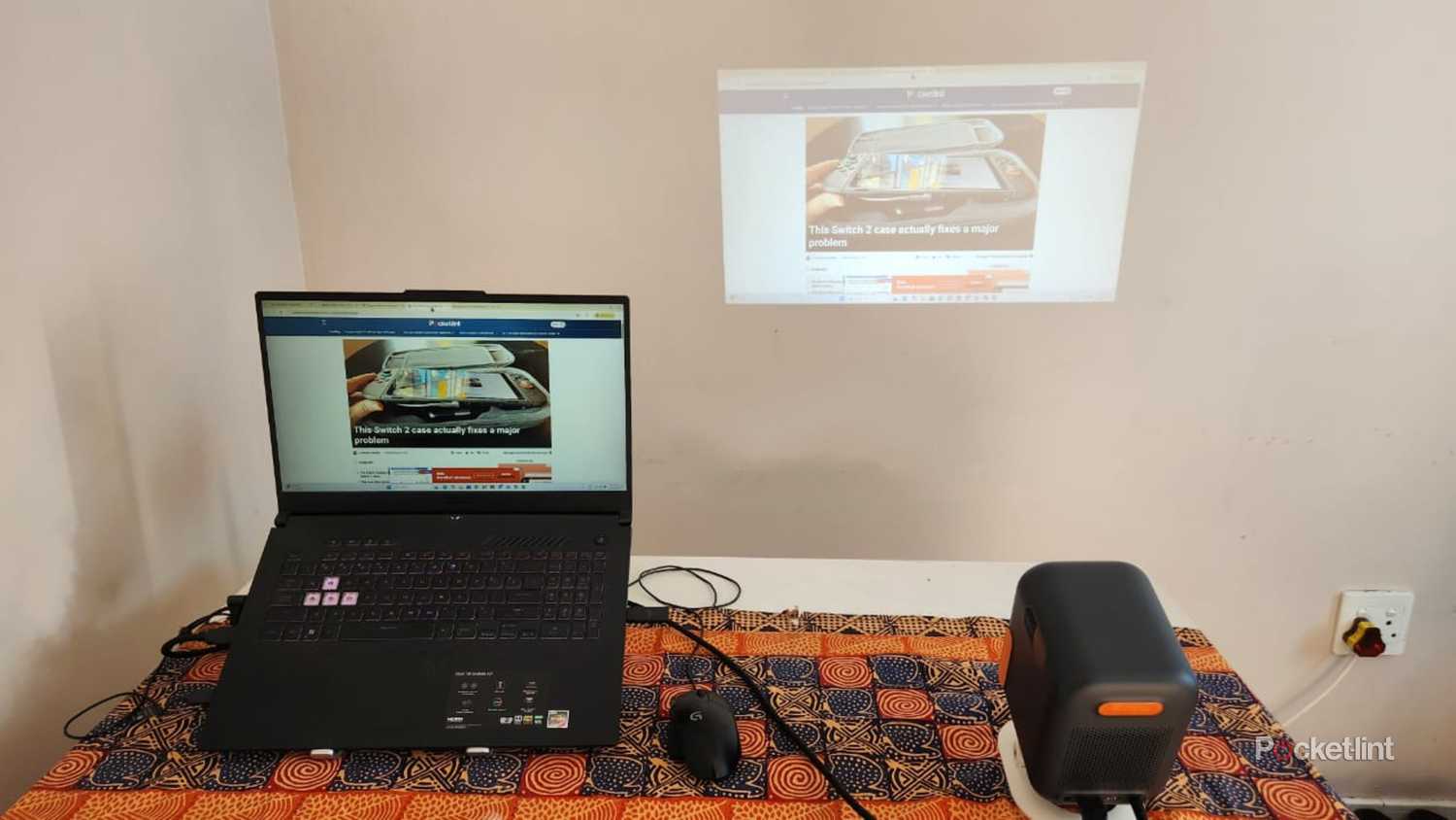 Laptop and Formovie projector