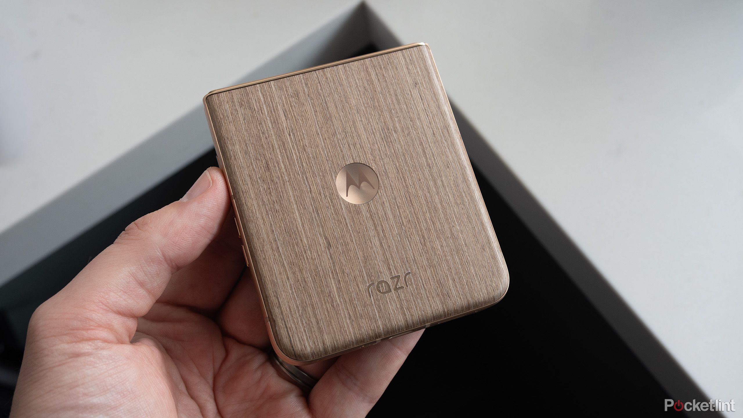 The Moto Razr Ultra 2025's woodgrain back 